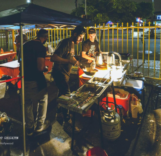 Original pop up photo of founders cooking 